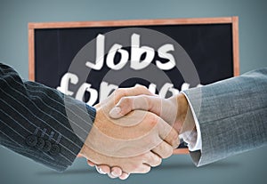 Composite image of business handshake against jobs