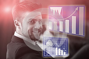 Composite image of business man against graph