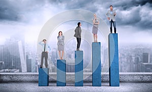 Composite image of business people standing