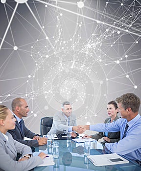 Composite image of business team during meeting