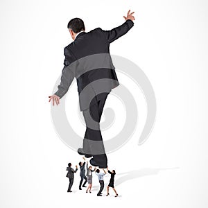 Composite image of business team supporting boss