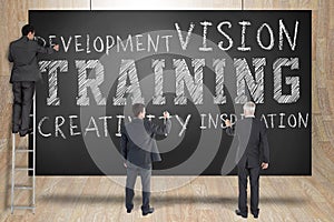 Composite image of business team writing