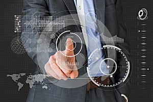 Composite image of businessman in grey suit pointing to menu