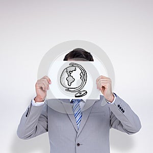 Composite image of businessman holding blank sign in front of his head