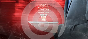 Composite image of businessman holding a digital tablet