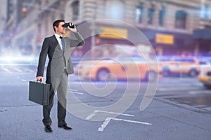 Composite image of businessman looking through binoculars