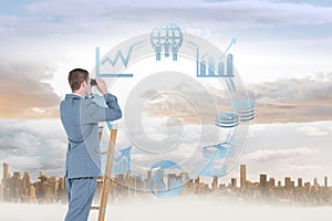 Composite image of businessman looking on a ladder