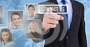 Composite image of businessman pointing his finger at camera