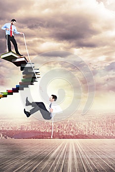 Composite image of businessman pulling a rope