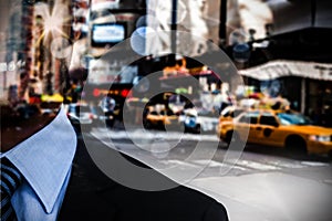 Composite image of businessman standing against white background