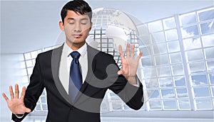 Composite image of businessman touching