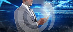 Composite image of businessman using smart phone photo