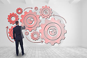 Composite image of businessman writing with chalk on white background