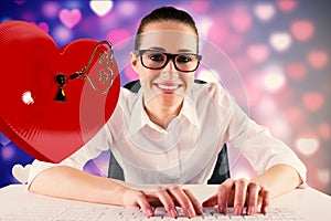 Composite image of businesswoman typing on a keyboard