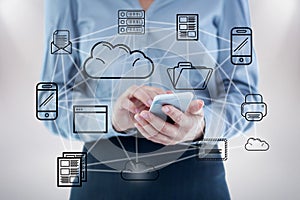 Composite image of businesswoman using smart phone