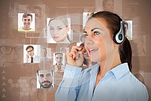 Composite image of call center agent looking upwards while talking