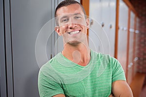 Composite image of casual man smiling at camera