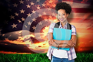 Composite image of casual young woman with folder in office