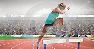 Composite image of caucasian female athlete jumping over hurdles against sports stadium