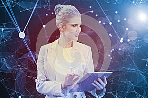 Composite image of cheerful stylish businesswoman using digital tablet