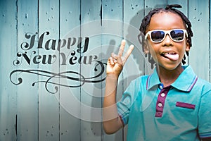 Composite image of child making wince