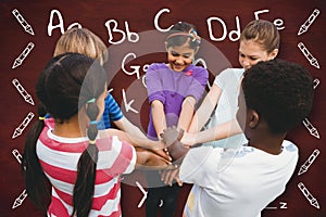 Composite image of children holding hands together at park