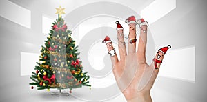 Composite image of christmas caroler fingers