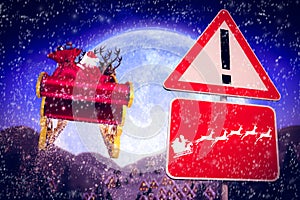 Composite image of christmas road sign