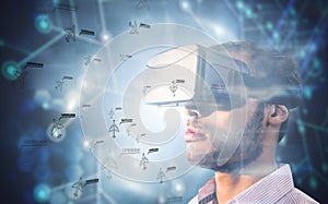 Composite image of close up of businessman holding virtual glasses