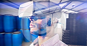 Composite image of close up of businessman holding virtual glasses