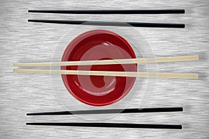 Composite image of close up of chopstick arranged by bowl