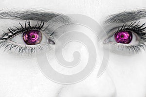 Composite image of close up of female blue eyes