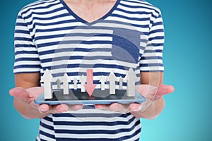 Composite image of close up of man holding tablet