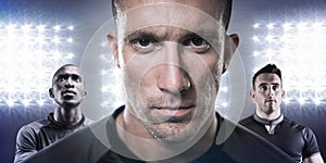 Composite image of close-up portrait of serious rugby player