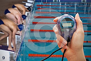 Composite image of close up of woman is holding a stopwatch on a white background