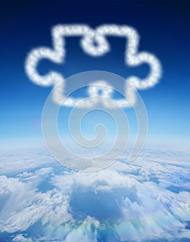 Composite image of cloud in shape of jigsaw piece