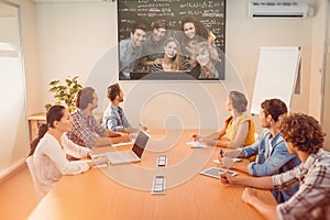Composite image of college students using computer
