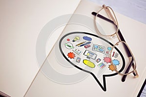 Composite image of composite image of computer icons in speech bubble