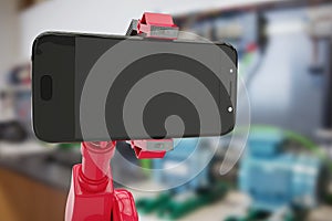 Composite image of composite image of red robot showing smart phone 3d