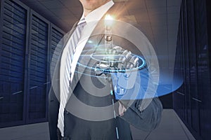 Composite image of computer graphic image of businessman with robotic hand in full suit 3d