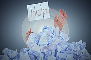 Composite image of conceptual image of woman in heap of crumple paper asking for help