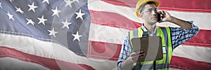 Composite image of construction worker on the phone