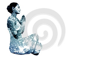 Composite image of content brunette in white sitting in lotus pose
