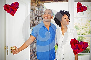 Composite image of couple and hearts 3d