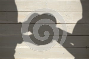 Composite image of couple holding heart shape gift