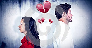 Composite image of couple standing back to back after arguing