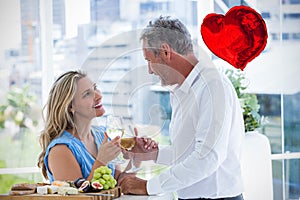 Composite image of couple and valentines hearts 3d