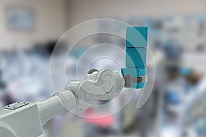 Composite image of cropped image of robotic hand holding stack of boxes 3d