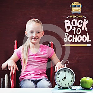 Composite image of cute disabled pupil smiling at camera in hall