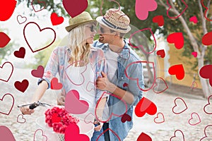 Composite image of cute valentines couple